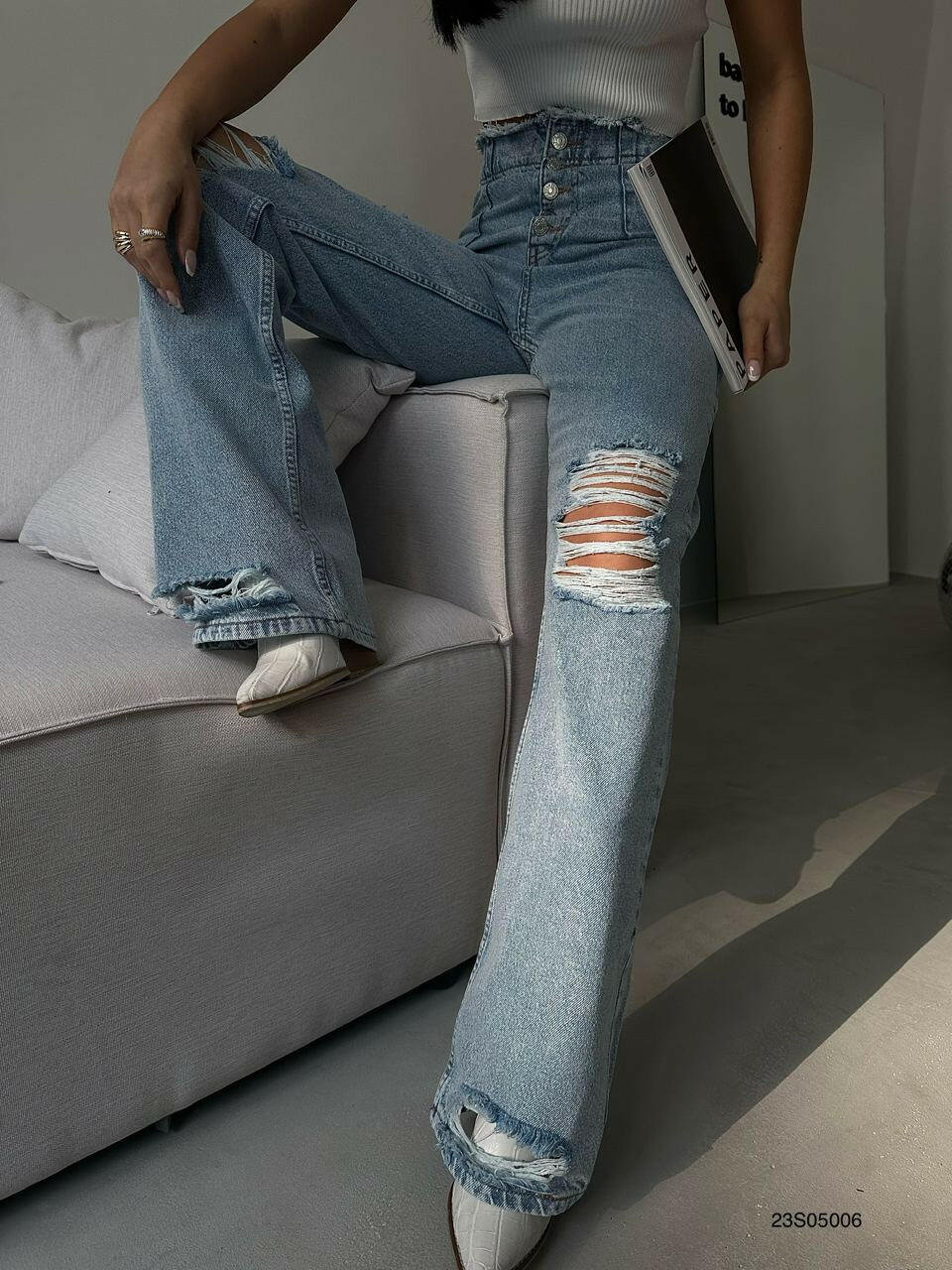Ripped Jeans with Multiple Button Detail